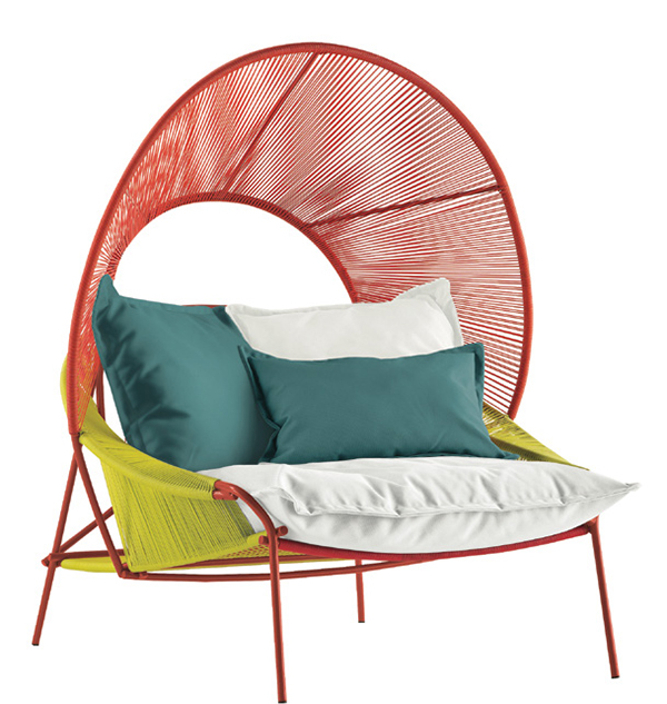 Burks’s Traveler collection for Roche Bobois includes this covered armchair. Roche Bobois