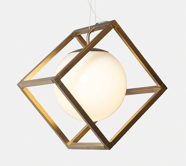 The Rockwell Group collaborated with the LED lighting company Rich Brilliant Willing to create a collection of customized luminaires based on geometric forms, such as spheres and cubes. The Witt (featured) is a modular twist on the traditional chandelier, and comes in a set of five hollow brass cubes that can be hung in different arrangements: horizontally, vertically, or at different heights. | COURTESY RICH BRILLIANT WILLING