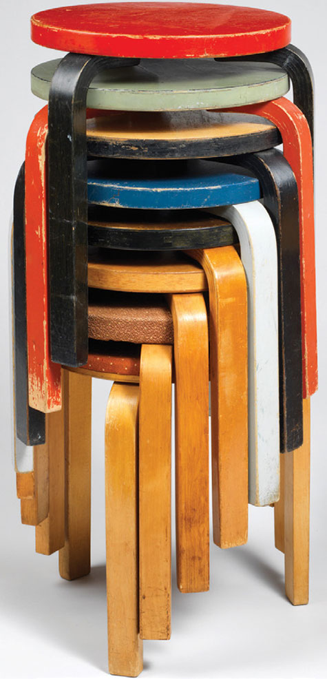 A spiral column of Alvar’s brightly colored Stacking Stools (1932–1933). | MUSEUM OF MODERN ART, GIFT OF ARTEK PASCOE, INC./DIGITAL IMAGE © THE MUSEUM OF MODERN ART/LICENSED BY SCALA/ART RESOURCE