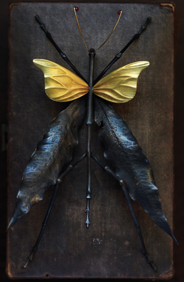 This insect ornament by Kiss is done in bronze and 18- and 14-karat gold and rubies, 2008. ALISON ROSA PHOTO