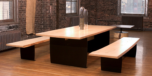 In this 2005 view of the Ralph Pucci showroom in Manhattan are a trestle table and benches made from an ash tree milled and dried on Lehrecke’s property in the Hudson valley with bases of blackened aluminum. DAN HOWELL PHOTO 