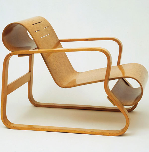 Alvar was inspired by Thonet’s bentwood curves, as seen in the bent-plywood, laminated and solid birch armchair (1931–1932) for the Tuberculosis Sanatorium in Paimio, Finland. | MUSEUM OF MODERN ART, GIFT OF EDGAR KAUFMANN JR., /DIGITAL IMAGE © THE MUSEUM OF MODERN ART/LICENSED BY SCALA/ART RESOURCE