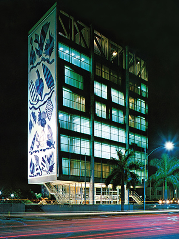 Bacardi Imports Tower, Miami. Enrique Gutierrez (SACMAG of Puerto Rico) and Francisco Brennand, muralist, 1963. Photograph, 1972. Courtesy of The Bacardi Archive.