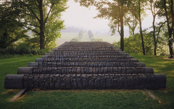 Land Rollers, 1992, as installed at Storm King, 1992–1994, was secured on a set of tracks at the crest of a hill, demonstrating a rapport with the surroundings as well as kinetic tension. | JERRY L. THOMPSON PHOTO, © URSULA VON RYDINGSVARD, COURTESY OF GALERIE LELONG