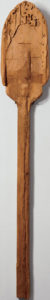 Paul’s Shovel, in cedar, 1987. Consisting of a flattened pole for a handle and a paddle-like wooden blade, the leveled scoop has been gouged around the edges in an almost calligraphic way. | DAVID ALLISON PHOTO, © URSULA VON RYDINGSVARD, COURTESY OF GALERIE LELONG