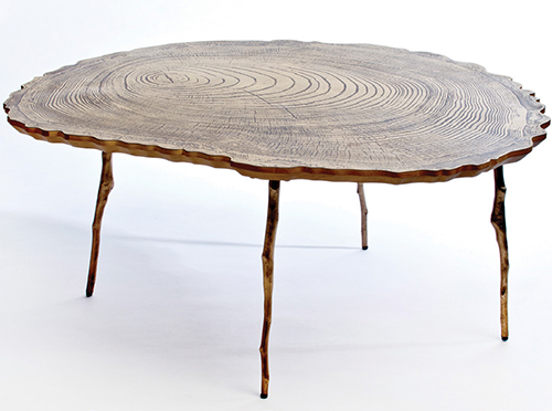 The Lean coffee table, in acid-etched brass and stacked laminated oak, with sand-cast bronze legs. | KENEK PHOTOGRAPHY/COURTESY WEXLER GALLERY