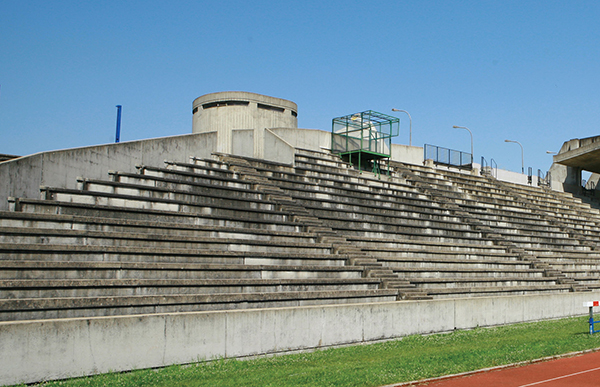 The stepped cement seating of the stadium accommodates some four thousand. | HUBERT GENOUILLAC/PHOTUPDESIGN, COURTESY FONDATION LE CORBUSIER