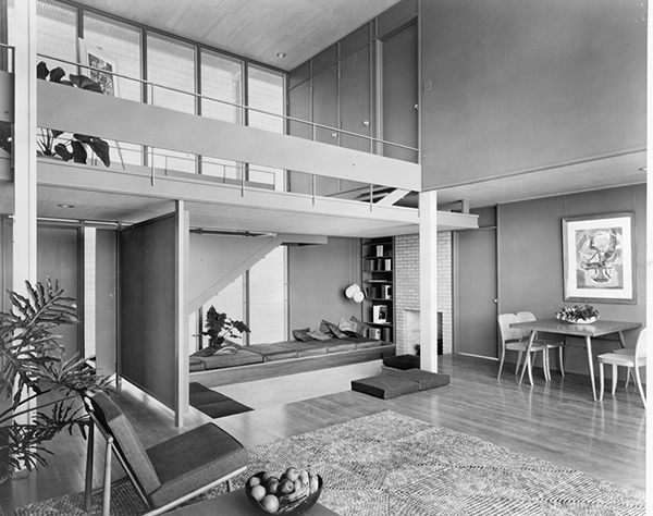 The open-plan interior of the 1,800- square-foot three-bedroom house, photographed in 1954 by Lionel Freedman, plays on volumes and planes. Leaving no space wasted, its double-height living room transitions to a sunken nook for reading and a single height area for dining. | COURTESY LIBRARY OF CONGRESS AND LIONEL FREEDMAN ARCHIVES