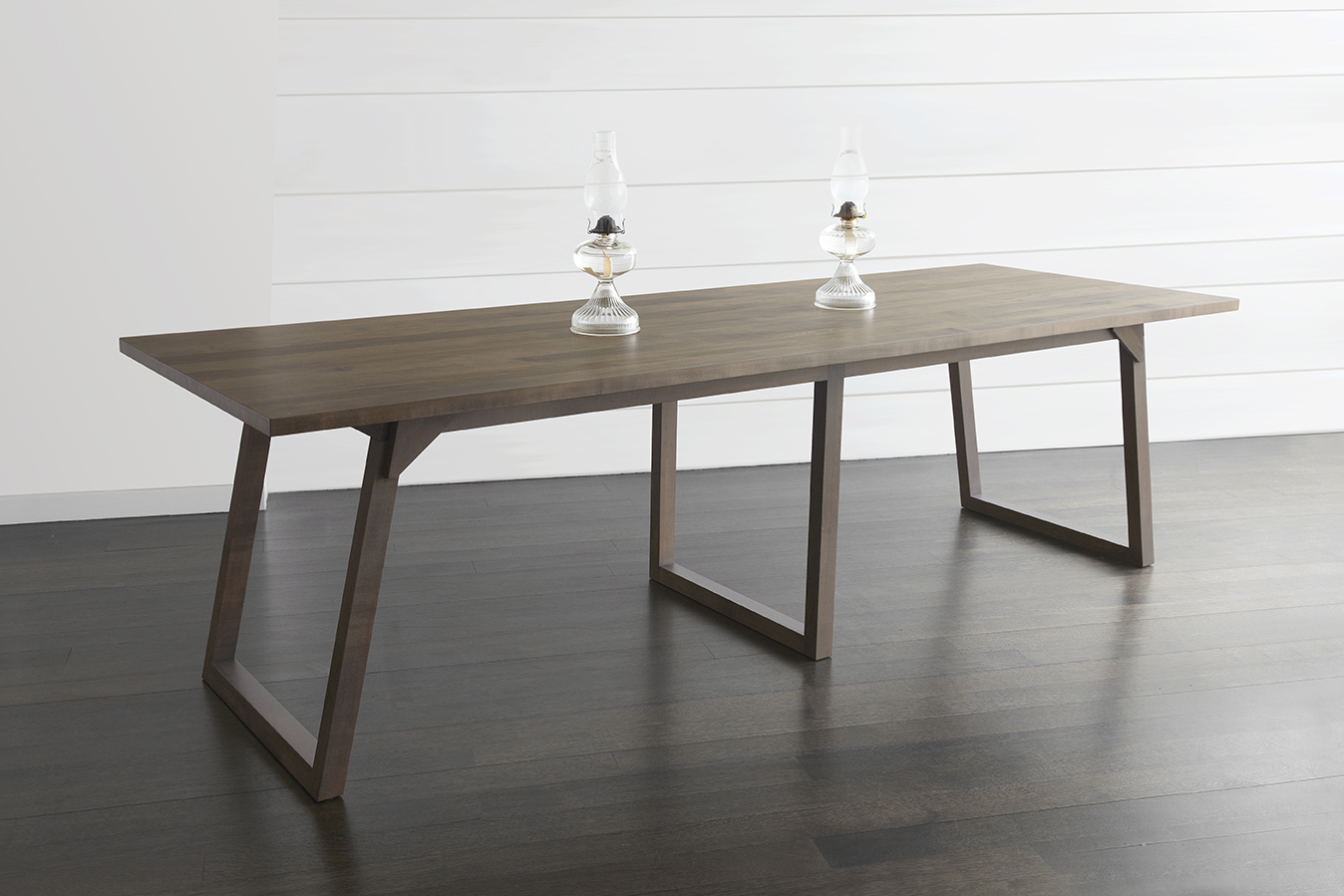 Familj Table by Bellboy in oxidized maple.
