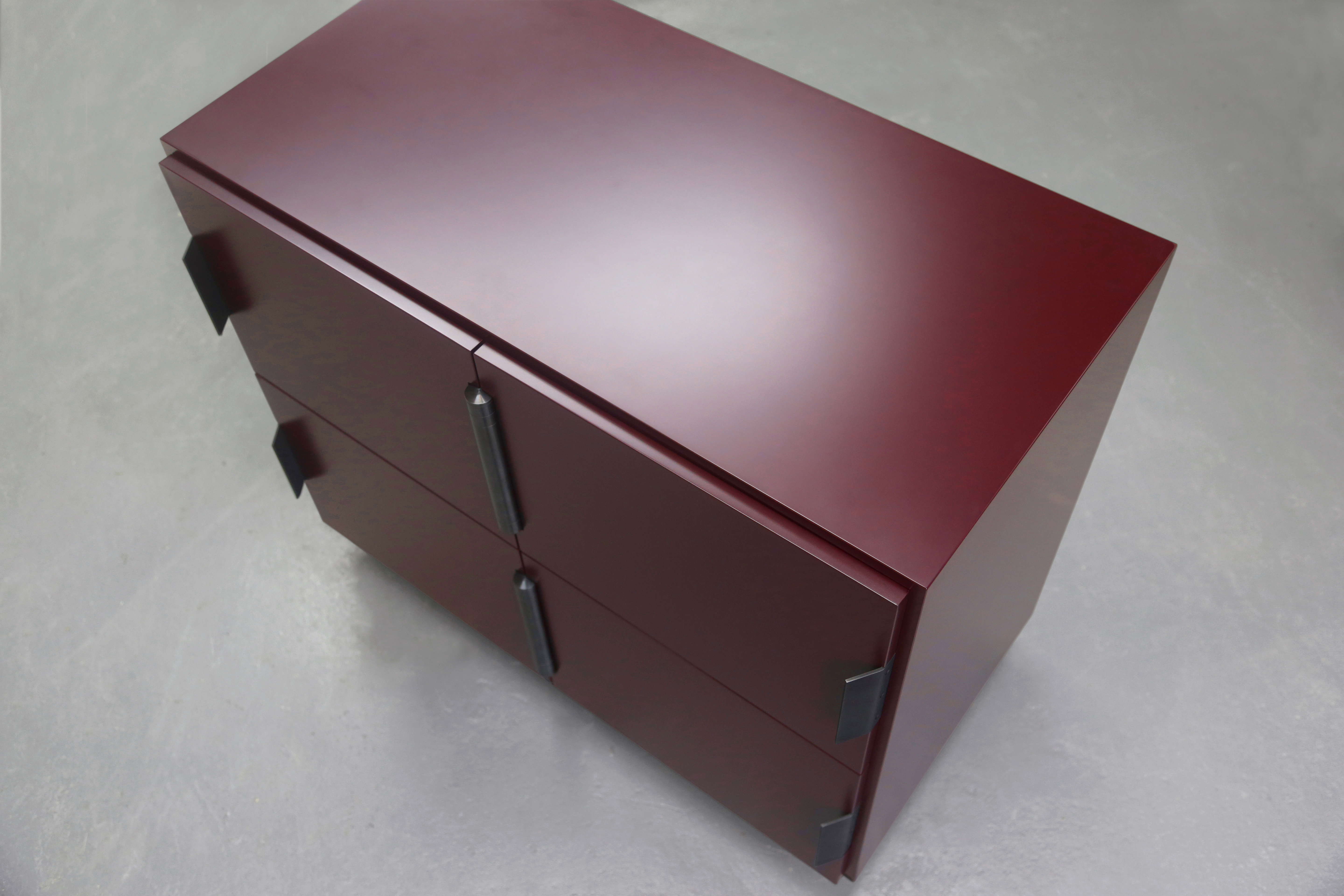 Nocturne by Bellboy in oxblood and blackened steel.