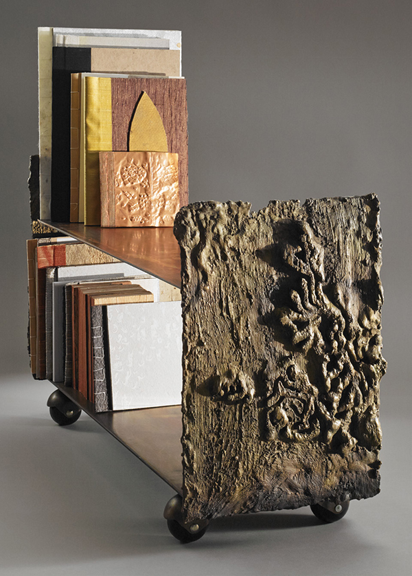 The Poetry Cart is a small library trolley made of cast and fabricated bronze, which the artist uses to hold volumes of poetry and handmade artist’s books she’s constructed from scraps of upholstery, snippets of paper, foraged and found objects as random as a salesman’s wood samples. | STUDIO LHOOQ PHOTOS/COURTESY PÉREZ ART MUSEUM MIAMI