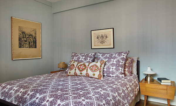 The nightstands in the master bedroom were designed by Paul Laszlo for Brown Saltman. Above the bed is an untitled ballpoint pen drawing by Eugene Von Bruenchenhein, and on the adjacent wall, a print by Jim Dine. | Photography by MARK ROSKAMS