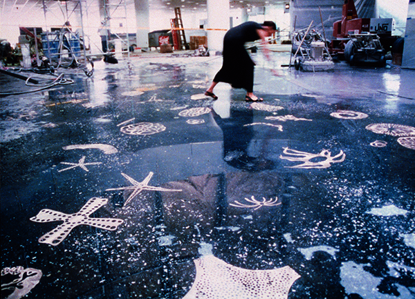 Michele Oka Doner working on A Walk on the Beach, her permanent installation at Miami International Airport, where nine thousand cast-bronze images of sea life are embedded in terrazzo with mother-of-pearl. The high shine of the terrazzo floor, long associated with Miami’s art deco, presents a gleaming visual allusion to the water surrounding the city. | LEA NICKLESS PHOTO